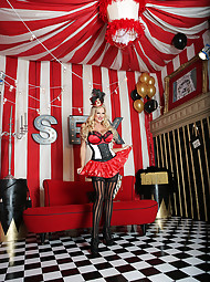 Here in her tent, surrounded by images that remind her of sex, Kelly can't help but to pull out her huge natural tits.