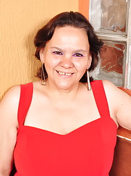Big breasted Latin mama playing with her toy