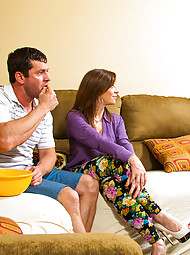 Sara is over joyed that Preston has come back to visit after being away at college for so long. While they are watching a movie with her son, she keeps inching her hand towards Preston cock. Preston notices and tries to shift on the couch while changing t