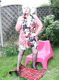 Naughty British housewife playing in the garden