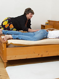 Naughty mature lady playing with her toy boy