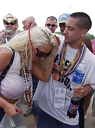 Sexy Karen Fisher shows off her huge tits all over in public.